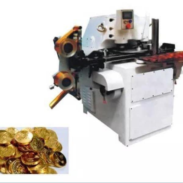 Máy dập kẹo đồng tiền