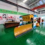 Máy xúc gắn lưỡi ủi tuyết