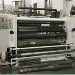 Máy rạch và cuộn giấy cuộn nhựa tự động